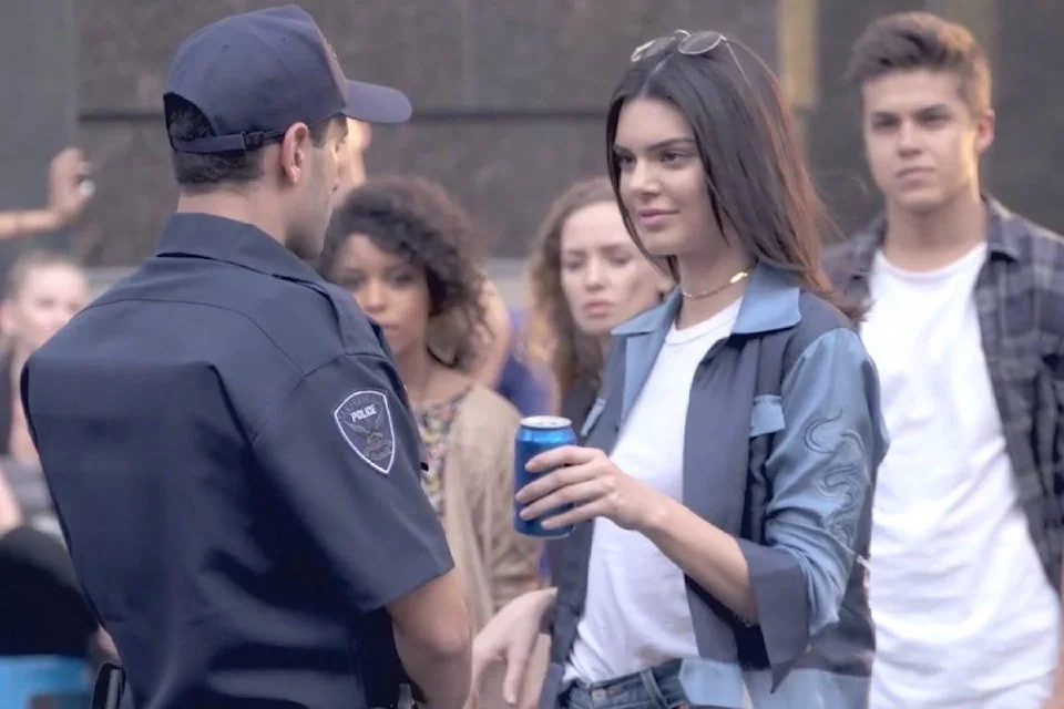  Kendall Jenner and a can of Pepsi to solve Black Lives Matter protests,... Source: https://www.goldstreamgazette.com/trending-now/video-pepsi-pulls-kendal-jenner-ad-after-online-backlash-558277 